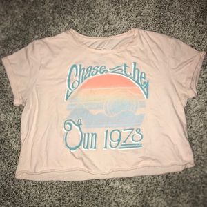 Baby Pink Cropped Billabong Graphic Tee.